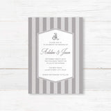 Gray striped wedding invitation with monogram crest, white panel, and classic serif and script fonts