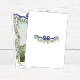 Personalized Christmas photo card featuring a family picture framed by cascading greenery, golden pears, and an elegant ribbon bow. The design includes a Merry Christmas greeting with a custom family name and year. back