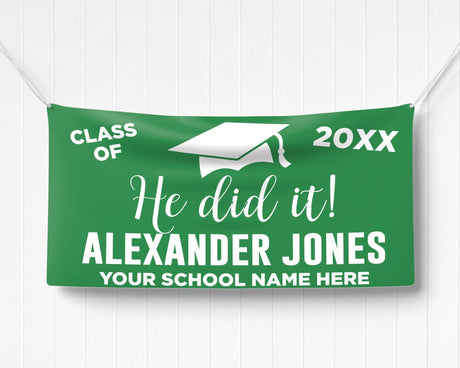 Bold "He Did It!" Graduation Vinyl Banner featuring a mortarboard cap, class year, and celebratory typography. Perfect for indoor and outdoor graduation decorations. Customizable colors and school name for any high school or college graduate. green