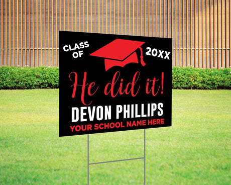 Custom graduation yard sign with bold typography and a mortarboard graphic, featuring personalized class year, school name, and celebratory message. Printed on durable Coreplast plastic, available in custom colors and single or double-sided print, perfect for high school and college graduates. red and black