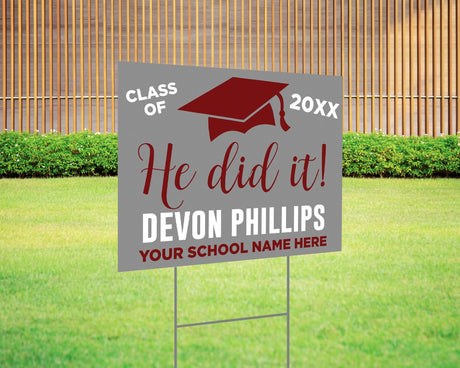 Custom graduation yard sign with bold typography and a mortarboard graphic, featuring personalized class year, school name, and celebratory message. Printed on durable Coreplast plastic, available in custom colors and single or double-sided print, perfect for high school and college graduates. gray and red