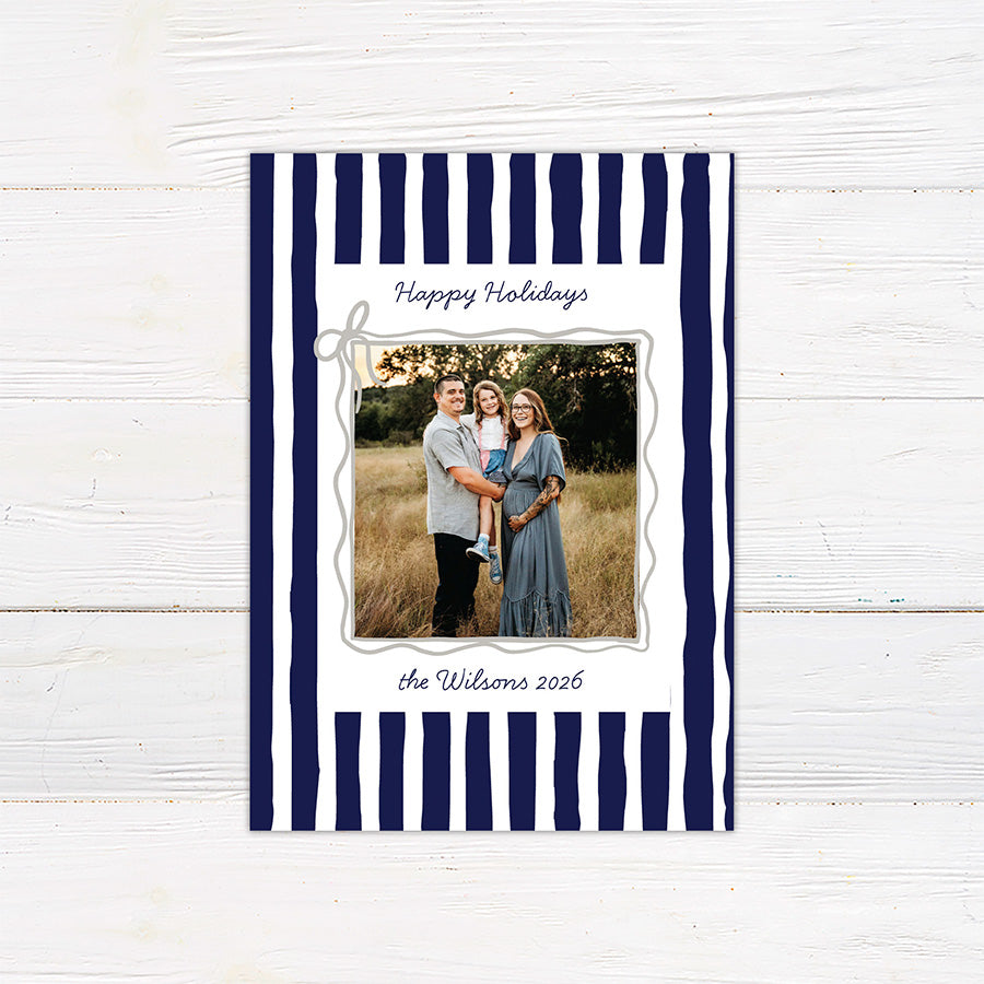 Personalized family holiday photo card featuring a bold hand-drawn striped border and centered family photograph. blue