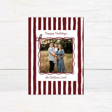 Personalized family holiday photo card featuring a bold hand-drawn striped border and centered family photograph. red