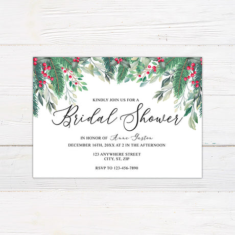 Winter holly berry bridal shower invitation featuring watercolor evergreen greenery, leafy branches, and bright red berries. The coordinating back continues the botanical design with greenery and red berry accents on a white background.