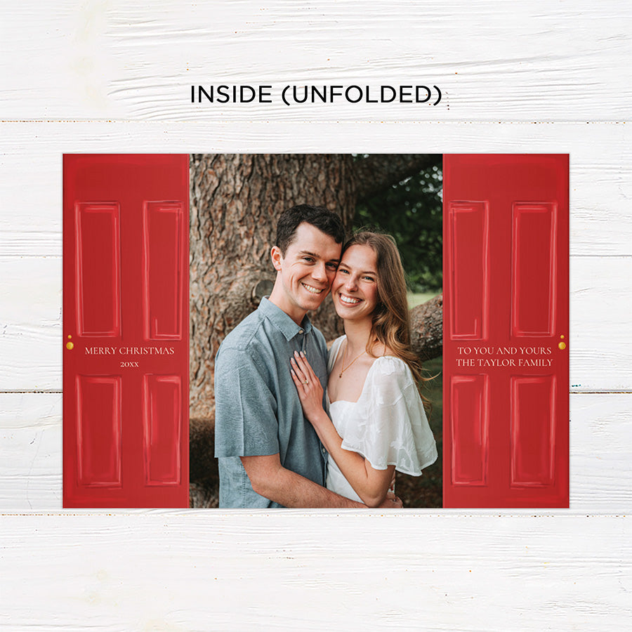 Personalized Home for the Holidays Christmas gatefold photo card featuring festive red double doors decorated with evergreen wreaths and customizable family photos. The folding holiday card opens to reveal a large photo and personalized Christmas greeting with an additional four-photo collage. Four-photo variant. - inside unfolded.