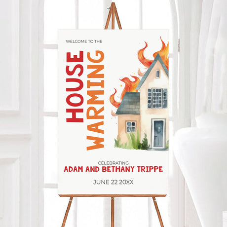 Housewarming welcome sign with a watercolor house illustration surrounded by flames, symbolizing warmth and excitement. Bold typography in red and orange emphasizes "House Warming," with event details below. Displayed on an easel, framed by a bright and inviting design. Perfect for greeting guests at a housewarming celebration.