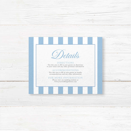 Printed wedding detail card with powder blue and white vertical stripes, white background, elegant serif text, and coordinating floral monogram crest, part of the Hydrangea Crest suite.