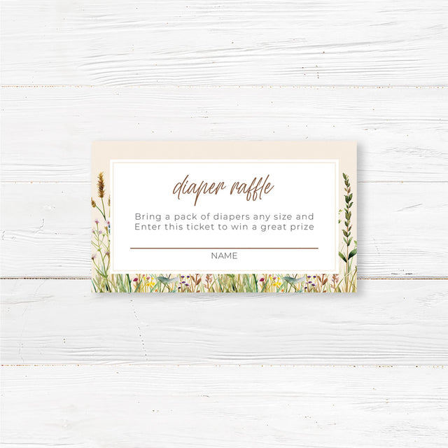 "A small rectangular card with a soft, neutral background featuring a charming floral, woodland, or baby-themed design. The text is in an elegant mix of script and serif fonts, inviting guests to participate in a diaper raffle by bringing a pack of diapers for a chance to win a prize. A designated space for the guest's name is included. The design complements the baby shower theme with a warm and festive feel."