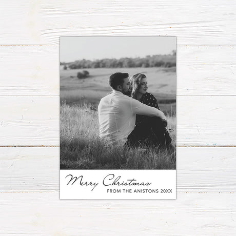 Personalized Timeless Black & White Christmas photo card featuring a large couple's portrait with an elegant Merry Christmas greeting. The reverse includes multiple photo spaces for sharing additional favorite memories.