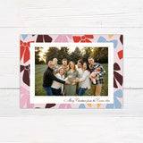 Personalized family Christmas photo card featuring a large photograph surrounded by a playful pattern of colorful ribbon bows. The coordinating back features an all-over illustrated bow pattern.