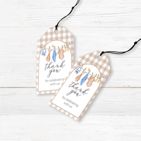 Rustic baby shower favor tags featuring a watercolor blue baby clothesline design with baby rompers, bibs, and socks. Professionally printed on premium cardstock with pre-punched holes for easy attachment to party favors, gift bags, and small thank-you gifts. A perfect addition to baby boy showers, gender reveals, or baby sprinkles. Complements a boho, country, or vintage baby shower theme while adding a charming personal touch.