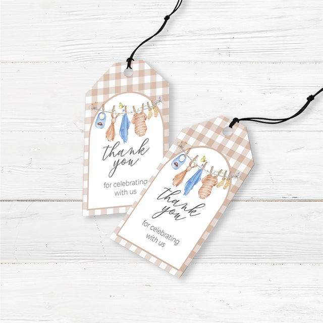 Rustic baby shower favor tags featuring a watercolor blue baby clothesline design with baby rompers, bibs, and socks. Professionally printed on premium cardstock with pre-punched holes for easy attachment to party favors, gift bags, and small thank-you gifts. A perfect addition to baby boy showers, gender reveals, or baby sprinkles. Complements a boho, country, or vintage baby shower theme while adding a charming personal touch.