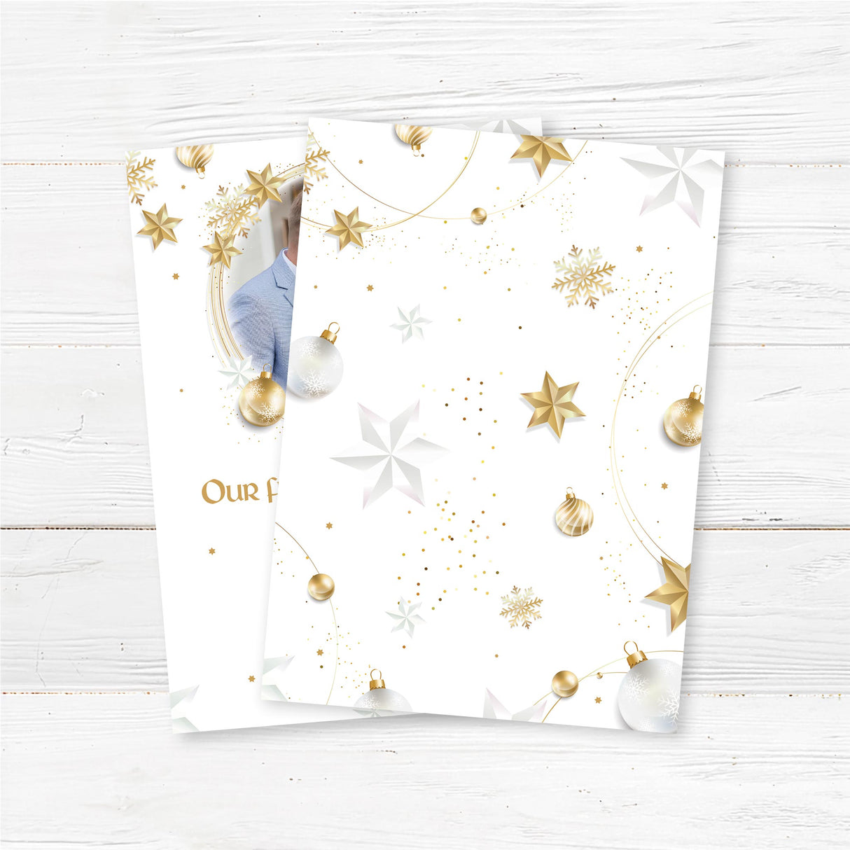 Our First Christmas as Mr. and Mrs. personalized photo card with gold stars and festive foliage on a white background.