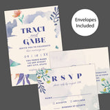 Colorful watercolor floral wedding invitation with bold serif names, playful script, and painted brushstroke accents on a cream background. Invite, RSVP, and Details