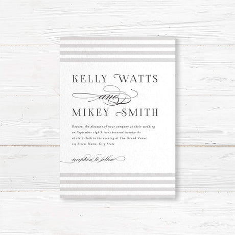 Wedding invitation featuring soft horizontal taupe and ivory stripes at the top and bottom, elegant serif fonts for names, romantic flourished script accents, and a white center panel.