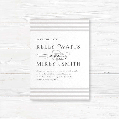 Announce your wedding with understated sophistication using the Paragraph Style Save the Date card. Featuring horizontal taupe and ivory stripes and elegant serif type, it coordinates with the suite for a cohesive and timeless presentation.