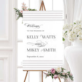 Wedding welcome sign with horizontal taupe and ivory stripe accents, elegant serif and script fonts, and minimalist layout, part of the Paragraph Style wedding stationery suite.