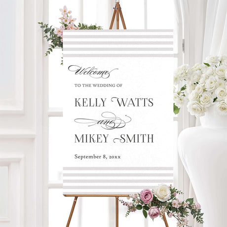 Wedding welcome sign with horizontal taupe and ivory stripe accents, elegant serif and script fonts, and minimalist layout, part of the Paragraph Style wedding stationery suite.
