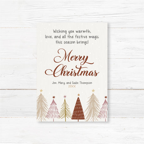 Rustic Christmas card with hand-drawn pine trees, falling snow, and customizable family name and year.