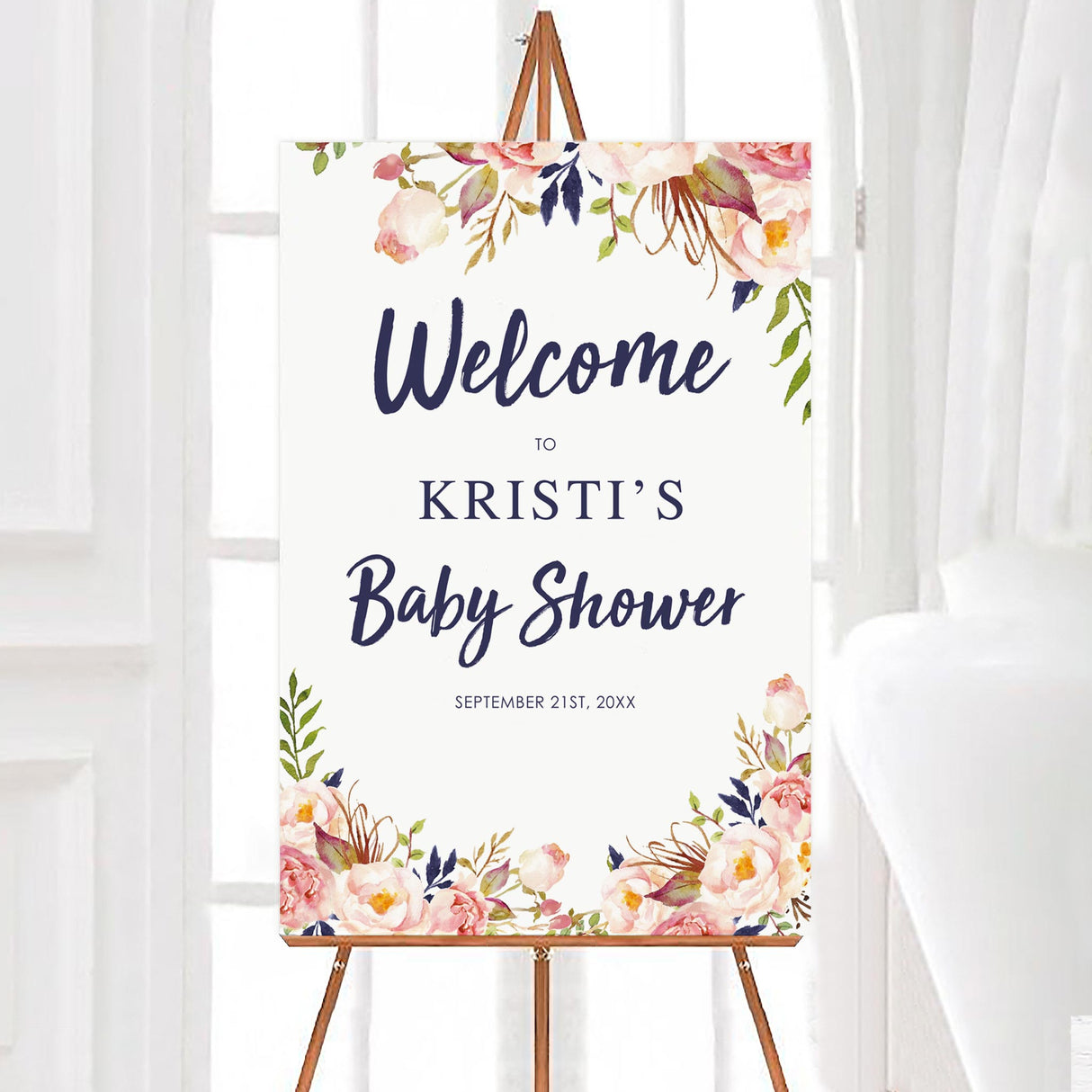A pink flower baby shower welcome sign with pink flowers and greenery. The design features elegant text on a white background.