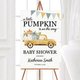 A pumpkin truck fall baby shower welcome sign with a pumpkin-filled truck and banner. The design features seasonal colors and farmhouse style.