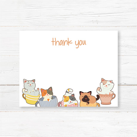 Printed cat-themed baby shower thank you card featuring adorable illustrated kittens inside teacups, making it perfect for tea party or cat lover baby showers. Printed on thick, high-quality cardstock and available in folded or flat designs with optional envelopes. Ideal for sending a heartfelt message of gratitude to guests after a baby shower, sprinkle, or tea party event. Coordinates with the full cat-themed baby shower stationery collection.