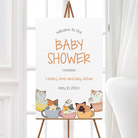 Foam core baby shower welcome sign featuring playful kittens inside teacups, designed for a cat-themed or tea party baby shower. Professionally printed on thick foam board for a sturdy and durable display, available in multiple sizes to fit different event spaces. Customizable with the honoree’s name and baby shower details. A perfect decorative touch to greet guests at a gender-neutral baby sprinkle or a tea-time-themed baby shower event.