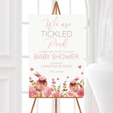 A Rabbits and Roses baby shower welcome sign with pink flowers and watercolor rabbits. The design uses soft pastel colors.