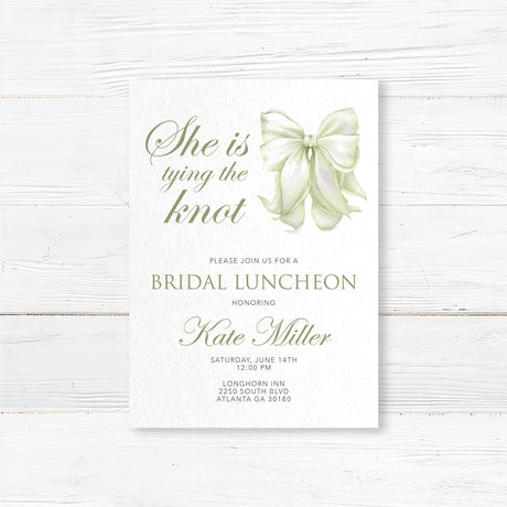 Bridal luncheon invitation with sage green watercolor bow and elegant script on textured white background for a tying the knot themed shower