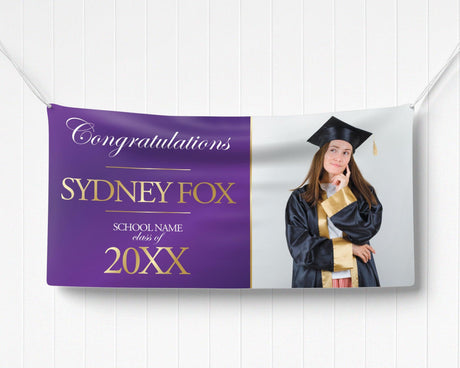 Graduation celebration vinyl banner with a split design featuring a bold congratulatory message in elegant gold text on one side and a proud graduate photo on the other. Made of durable, weatherproof vinyl, perfect for indoor and outdoor graduation party decorations, senior recognition, and high school or college ceremonies. purple