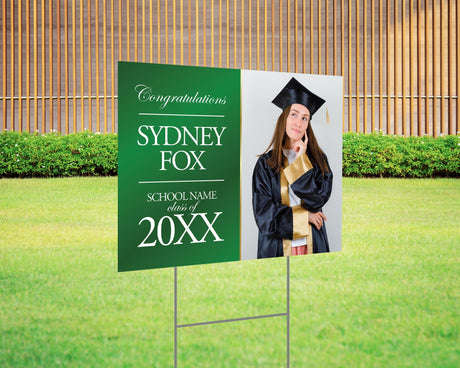 Graduation yard sign featuring a split design with a side photo and bold gold text on the left, displaying the graduate’s name, class year, and school name. Printed on durable Coreplast plastic, available in custom colors and single or double-sided print, perfect for high school and college graduation celebrations. green white