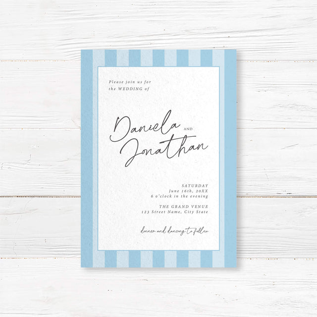 Minimalist wedding invitation with alternating soft blue and white vertical stripes, a white center panel, and elegant handwritten script and serif font layout for a clean modern wedding style.