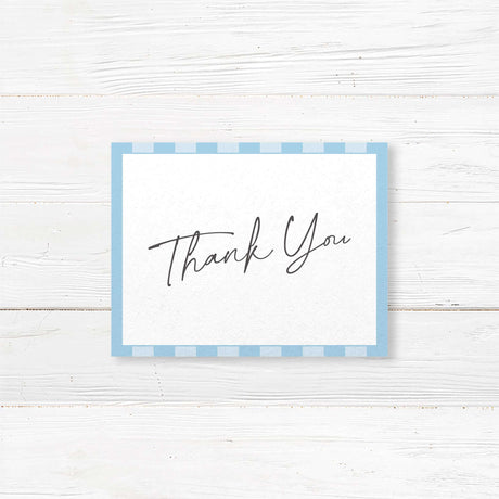 Wedding thank you card with soft blue and white vertical stripes, clean white panel, handwritten and serif fonts, and minimalist layout for the Simply Written suite.