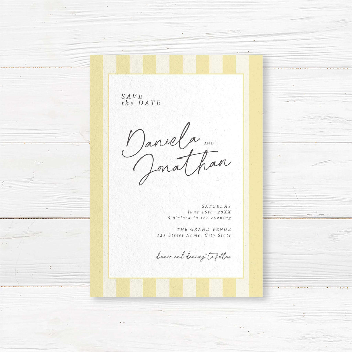 Save the Date card with vertical pale yellow and ivory stripes, minimalist white panel, and a mix of handwritten script and serif fonts to match the Simply Written suite.