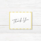 Wedding thank you card with pale yellow and ivory vertical stripes, minimalist white center, and a mix of handwritten and serif fonts to match the Simply Written suite.