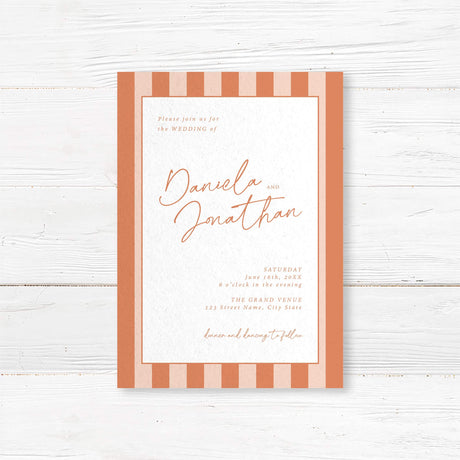 Modern wedding invitation with vertical terracotta and neutral stripes, minimalist white panel, handwritten and serif font combination for a stylish fall or rustic wedding design.
