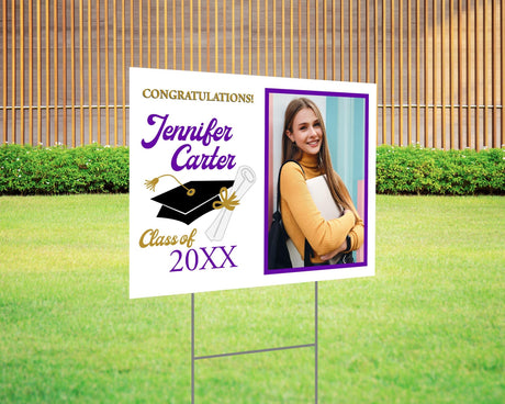 Congratulations graduation yard sign featuring a split design with a side photo, bold script name, mortarboard cap, and diploma graphic, along with the class year and school name in gold accents. Printed on durable Coreplast plastic, available in custom colors and single or double-sided print, perfect for high school and college graduates. purple and gold