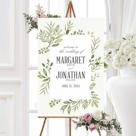 Nature-inspired wedding welcome sign featuring soft watercolor greenery and modern calligraphy. Printed on durable foam core or poster board. Customizable with names and wedding date. Available in multiple sizes. Ideal for rustic, elegant, and botanical wedding themes.