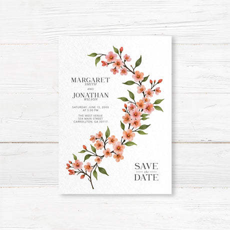 Elegant floral save the date card featuring hand-painted cherry blossoms and modern script typography. Customizable with names, wedding date, and location. Printed on high-quality cardstock with matching envelopes. Ideal for rustic, spring, and outdoor weddings, ensuring guests mark their calendars in style."