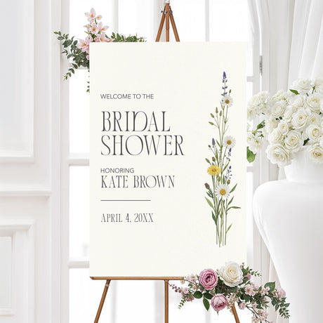 Bridal shower welcome sign featuring a minimalist wildflower arrangement with elegant script typography. Customizable with the bride’s name and event details, perfect for rustic or garden-themed bridal showers.