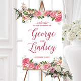 Wedding welcome sign with watercolor stargazer lilies and roses in pink tones, paired with elegant fonts. A perfect match for Stargazer Spring wedding suite.