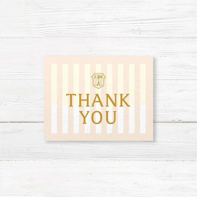 Cream and gold wedding thank you card with vertical stripes and elegant serif font