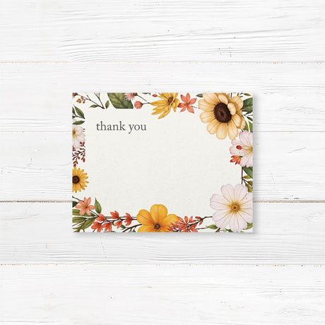 Bridal shower thank-you card featuring watercolor summer wildflowers in warm tones, printed on premium cardstock for a floral-themed event.