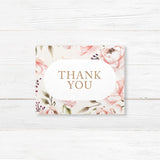 Beautiful blush floral wedding thank you card featuring soft watercolor peonies. Printed on premium textured cardstock with optional envelopes for a refined touch