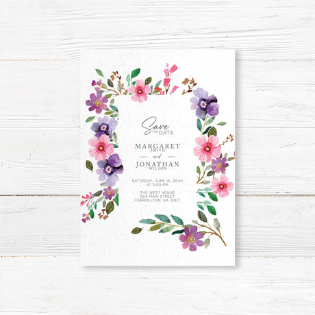 Beautiful floral save the date card with watercolor pink and purple flowers. Ideal for romantic and botanical weddings. Printed on high-quality textured cardstock with customizable details including names, wedding date, and location.