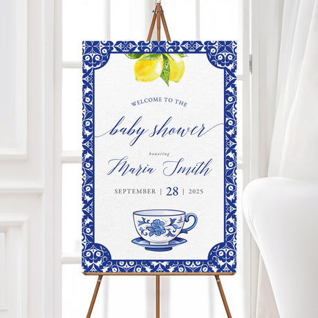 "Elegant tea party welcome sign featuring a classic blue and white ornate border, watercolor lemons, and stylish script lettering. The design creates a sophisticated and charming atmosphere, perfect for greeting guests at a tea-themed celebration with a timeless and refined touch."