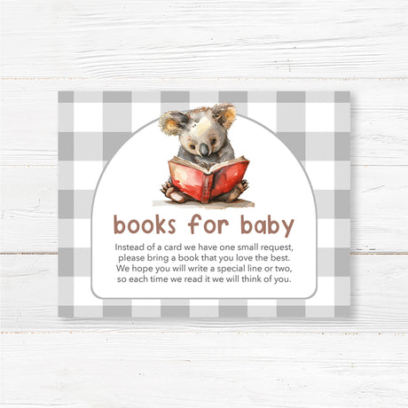 Books for Baby card featuring a watercolor koala reading a red book, set against a neutral buffalo plaid background. Text reads "The Next Chapter is about to begin," with customizable event details. Perfect for literary or woodland-themed celebrations.