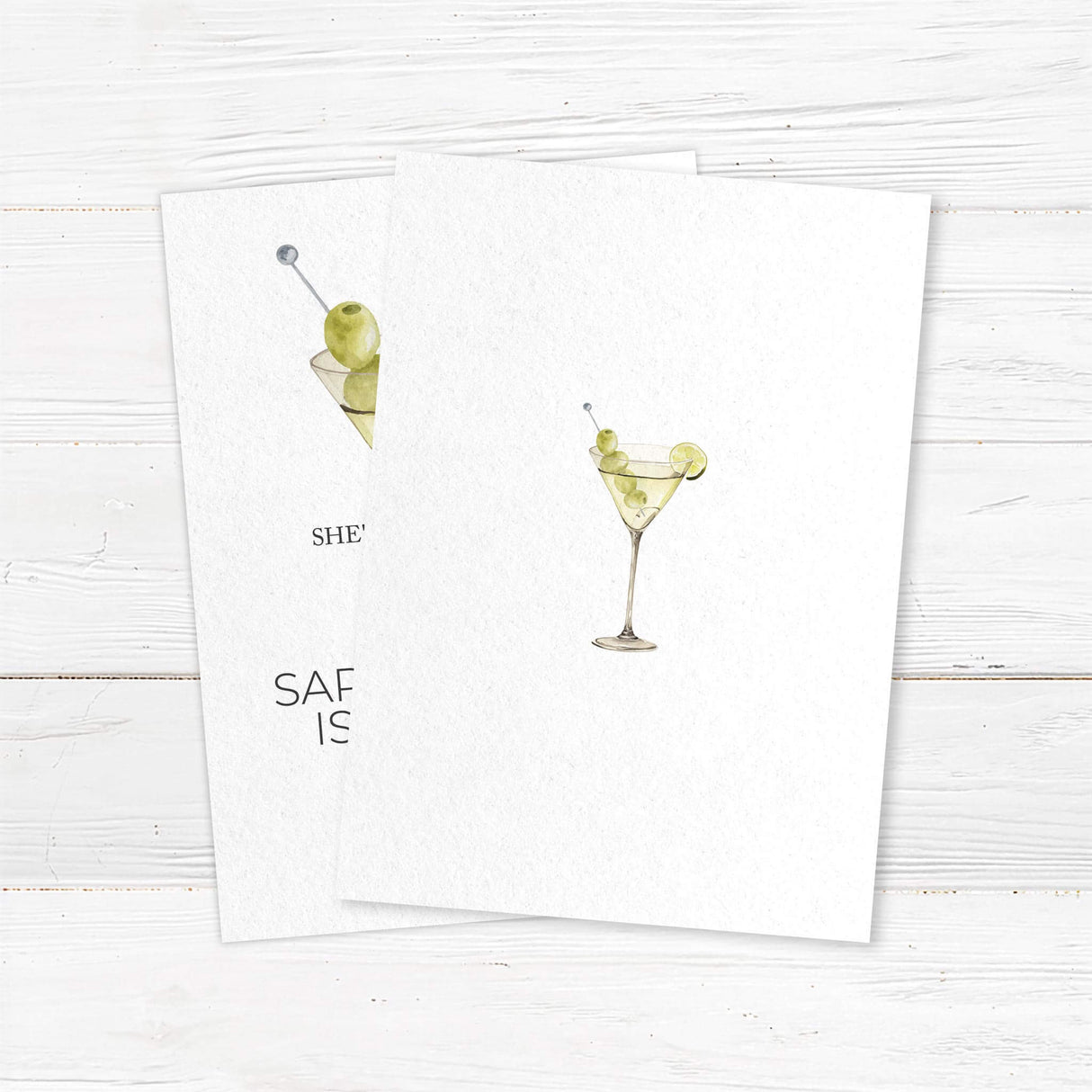 Birthday party invitation featuring a watercolor martini glass with green olives and lime, playful script and serif fonts, and text that reads “She’s a tini bit older,” ideal for cocktail-themed birthday parties. - back side