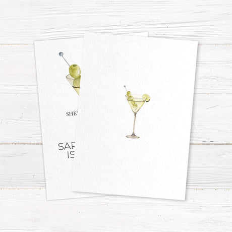 Birthday party invitation featuring a watercolor martini glass with green olives and lime, playful script and serif fonts, and text that reads “She’s a tini bit older,” ideal for cocktail-themed birthday parties. - back side