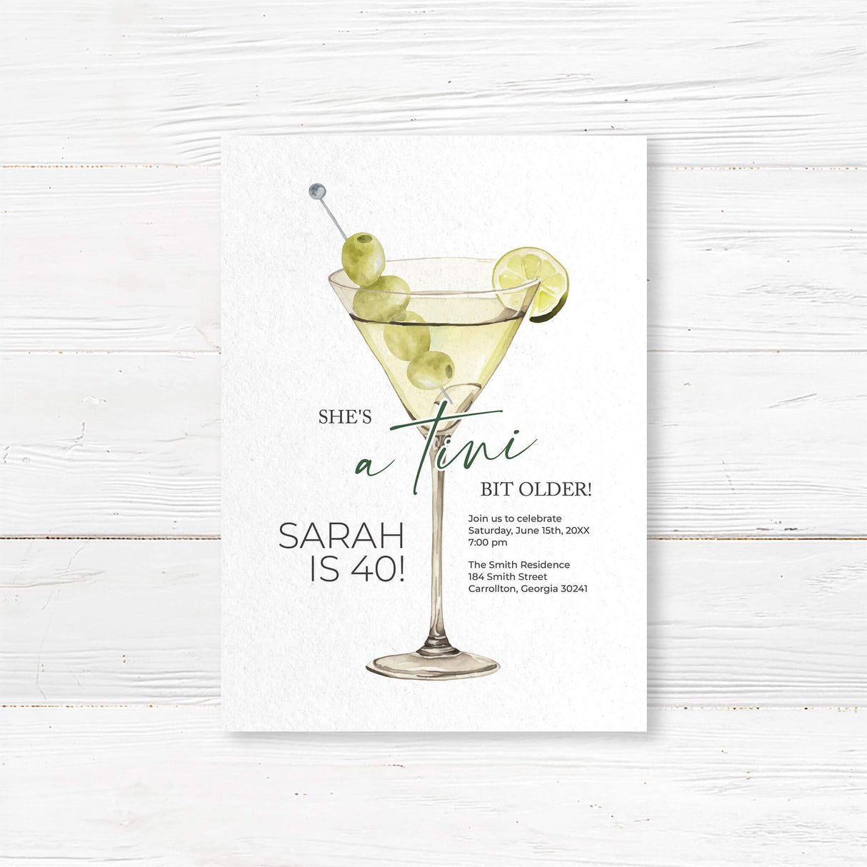Birthday party invitation featuring a watercolor martini glass with green olives and lime, playful script and serif fonts, and text that reads “She’s a tini bit older,” ideal for cocktail-themed birthday parties.